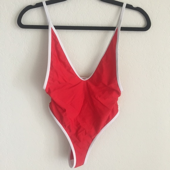 red one piece swimsuit with white piping